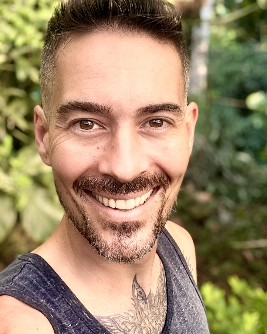 James Passatore, smiling, in the jungle
